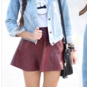 Maroon leather skirt, never worn. Tags still on!